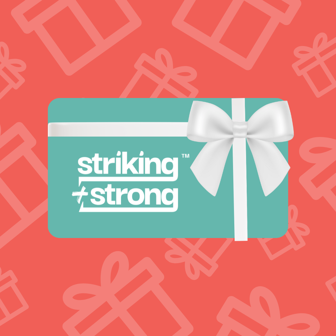 Teal gift card with white bow on a red background with gift box patterns, featuring the brand 'striking strong'.